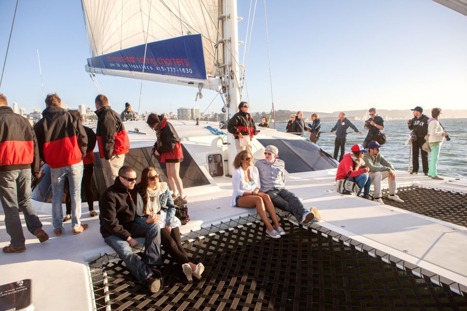 San Francisco Bay Sunset Cruise by Luxury Catamaran - Sausalito shoreline and the skyline glow