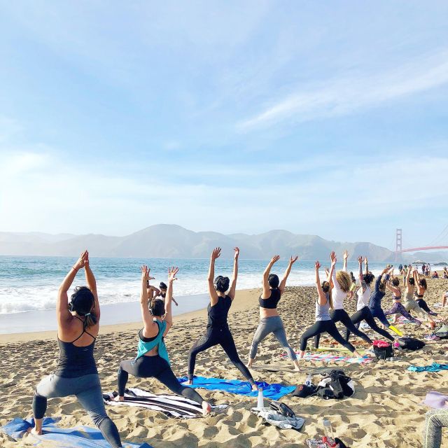 San Francisco: Silent Disco Yoga at Baker Beach - Gear Included: The Towel and Headphones That Remove Barriers